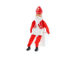 Saint Nicholas sitting moving legs