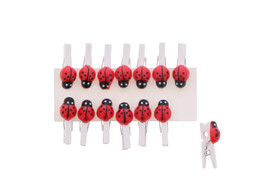 Pince coccinelle en plastique rouge